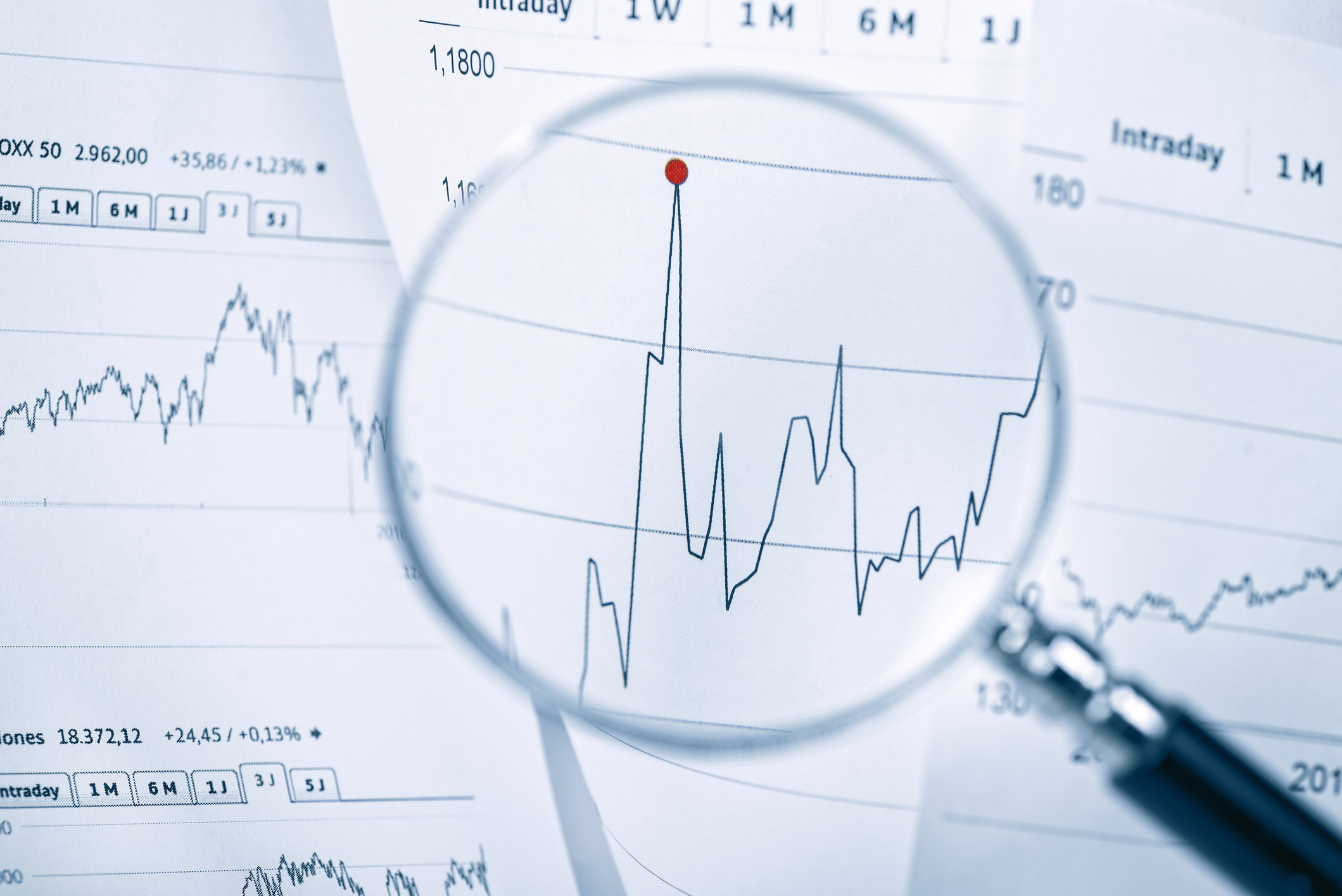 Magnifier magnifying a statistics on a paper