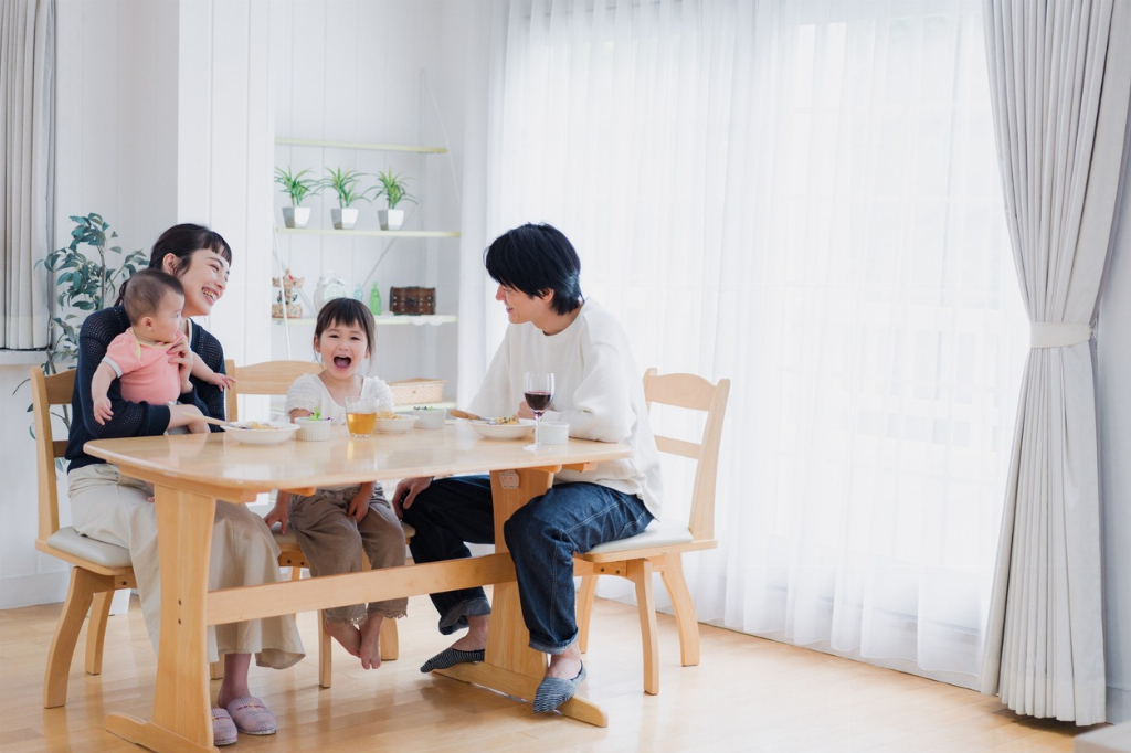 A happy family eating dinner together