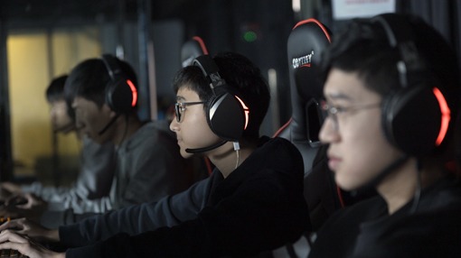 people playing on a computer