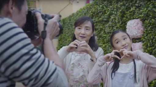 family taking a photo