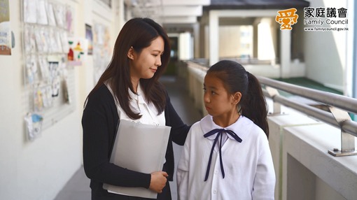 A teacher talking to a student