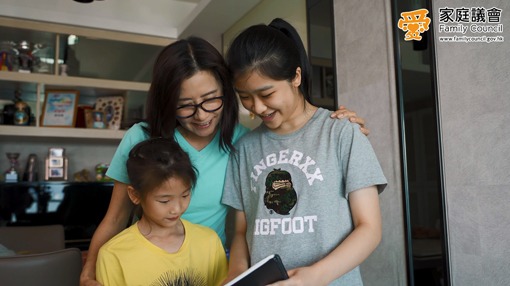 A family reading a book
