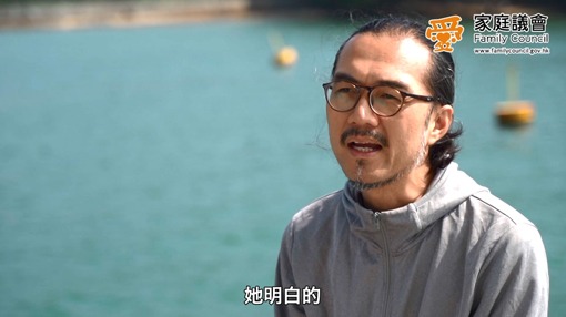 A person talking by the sea