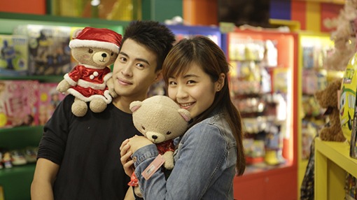 couple holding a teddy bear